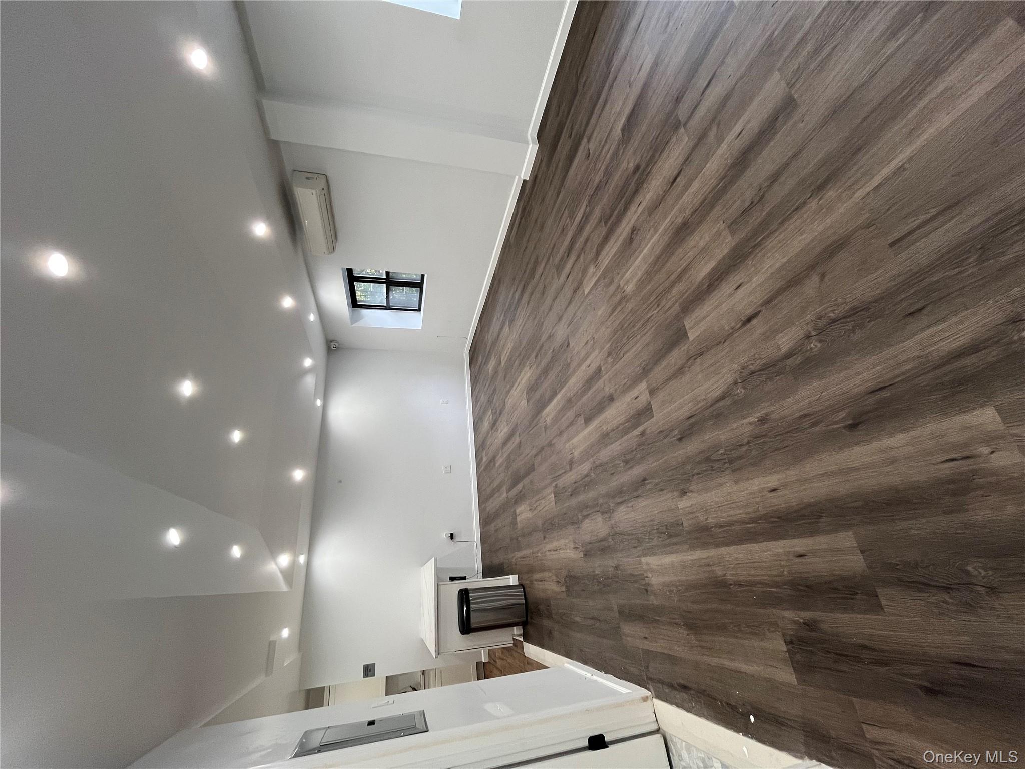 2545 Sedgwick Avenue, Unit 7B Bronx, NY 10468 - Photo 17 of 20 a view of empty room with wooden floor