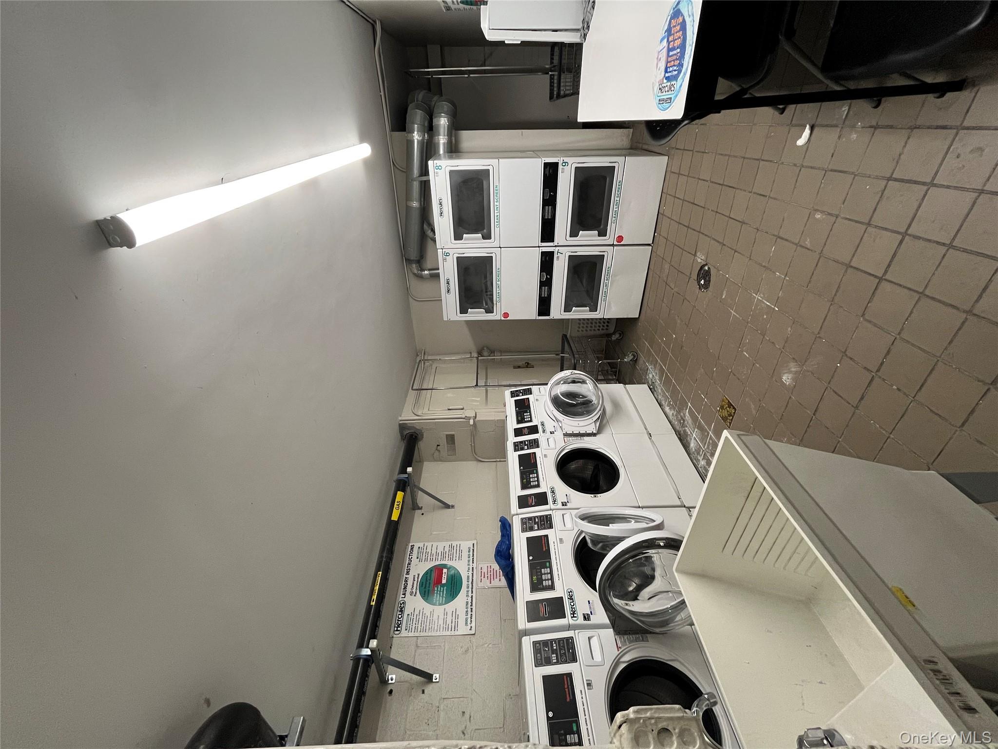 2545 Sedgwick Avenue, Unit 7B Bronx, NY 10468 - Photo 3 of 20 a utility room with dryer and washer