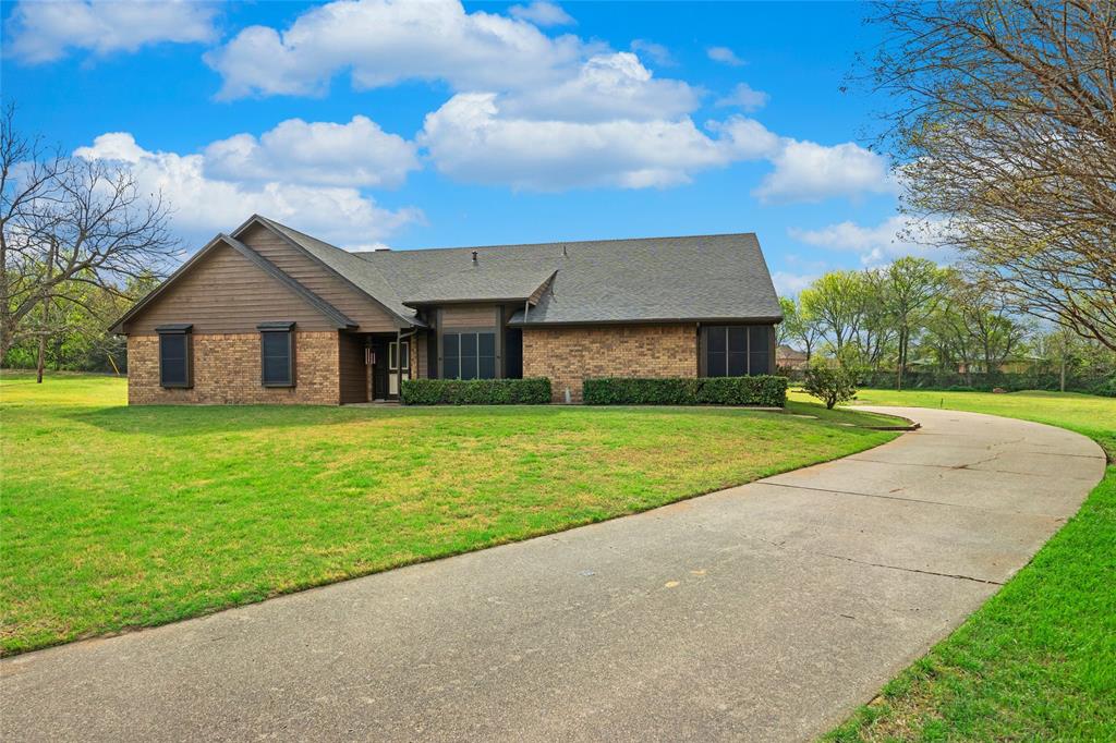 5840 Crystal Drive Midlothian, TX 76065 - Photo 2 of 36 a front view of house with yard and green space