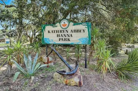 front view of a house with a garden