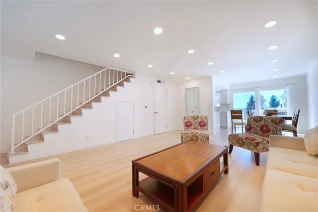 a view of parking garage with cars