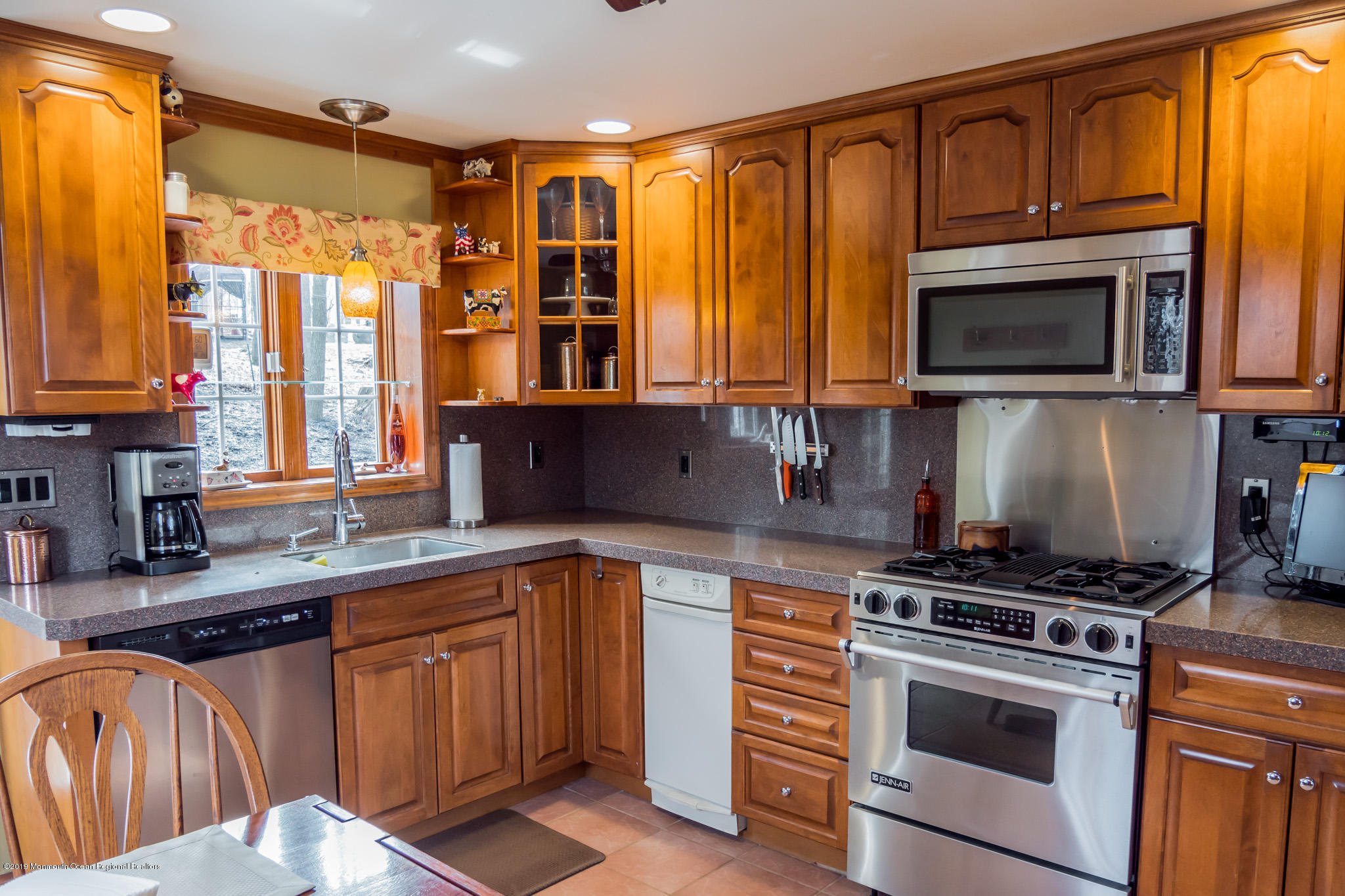 20 Ridge Road Hopatcong, NJ 07843 - Photo 12 of 30 a kitchen with stainless steel appliances a stove sink and microwave