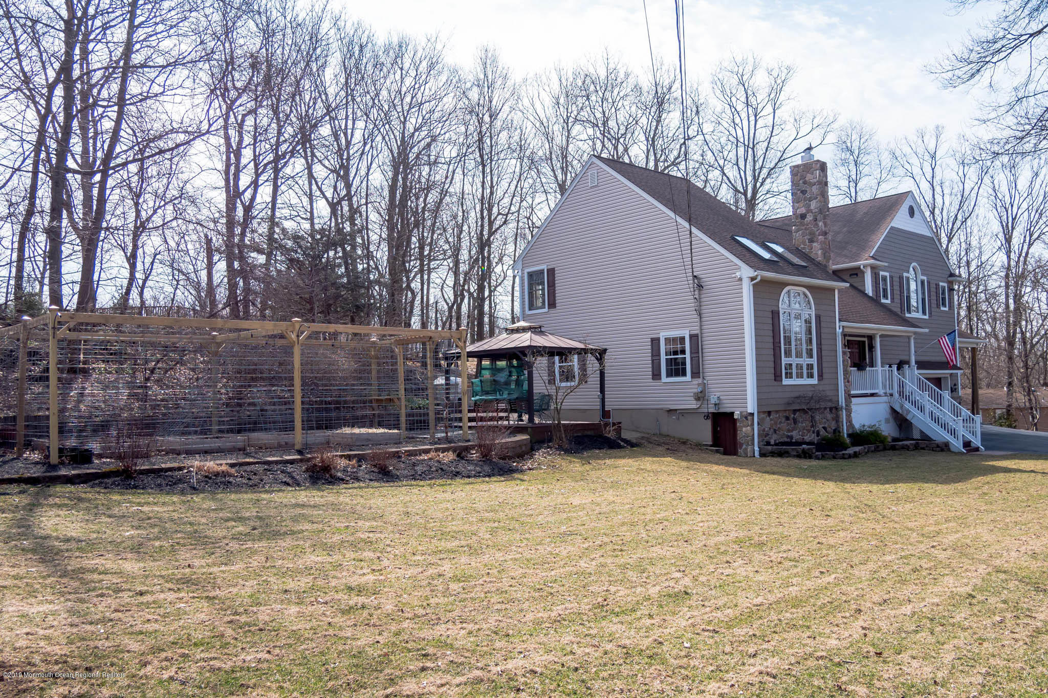 20 Ridge Road Hopatcong, NJ 07843 - Photo 30 of 30 a view of a house with a yard and large trees