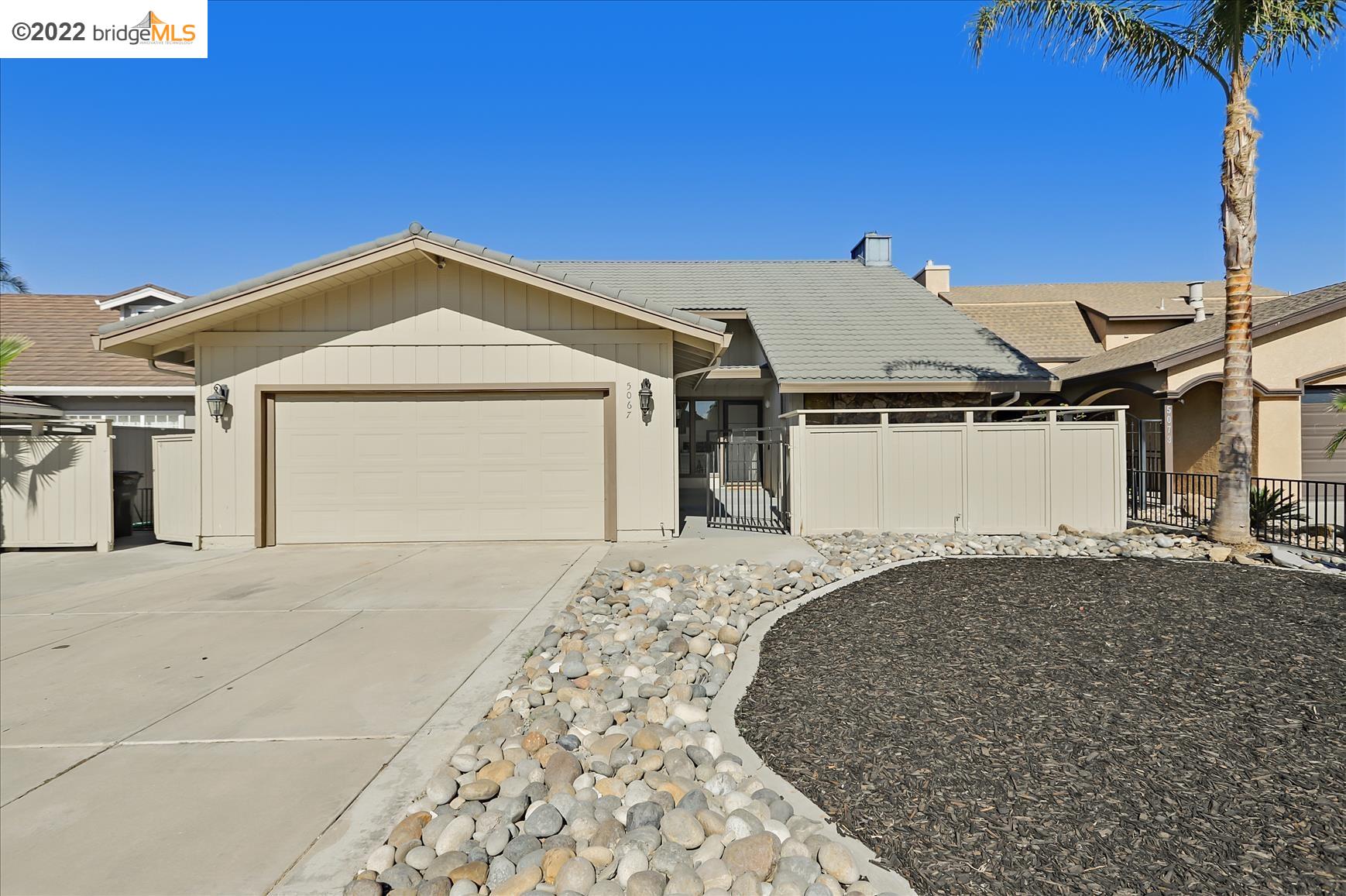 5067 Cabrillo Point Discovery Bay, CA 94505 - Photo 1 of 1 a front view of a house with a yard