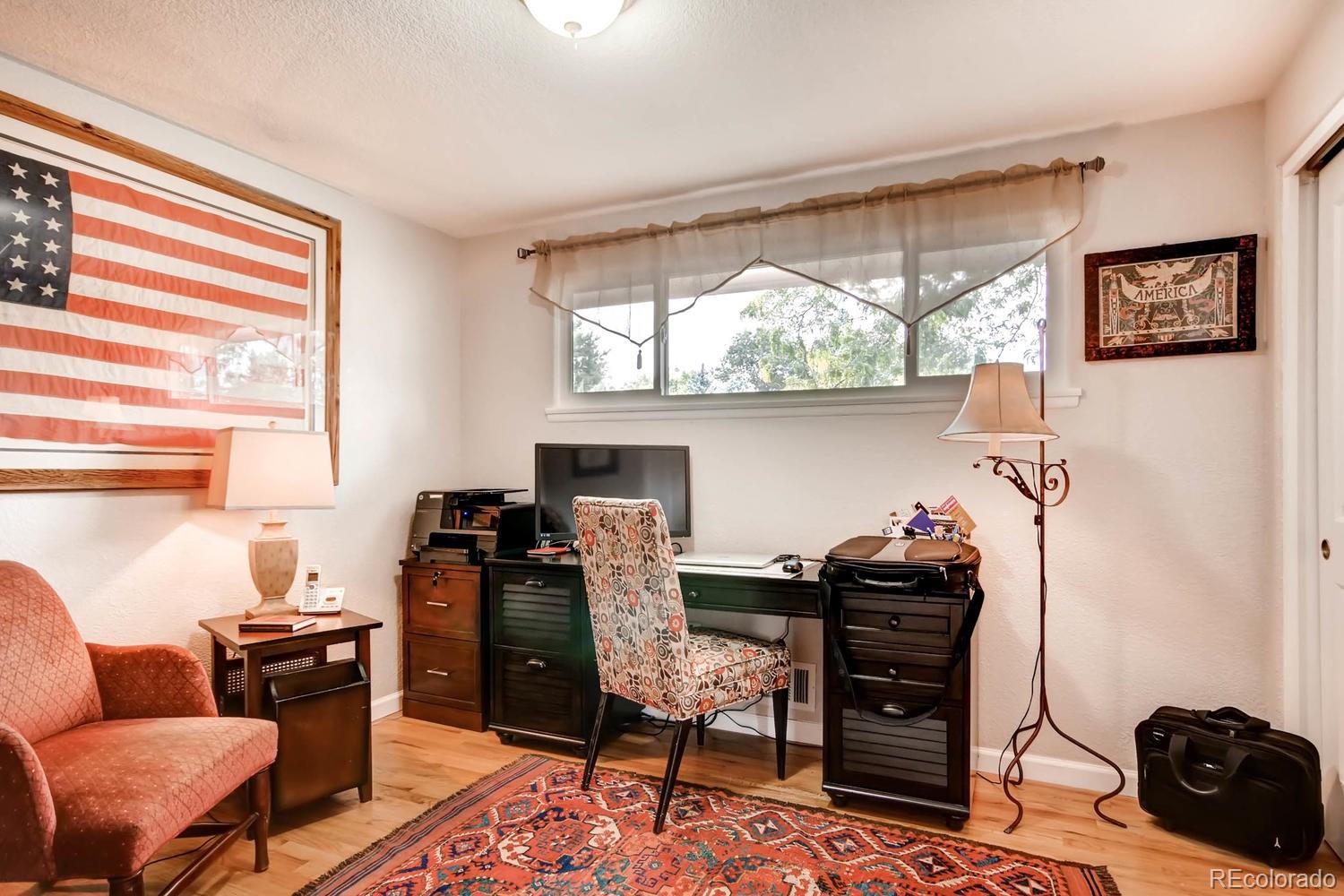 3660 Hoyt Court Wheat Ridge, CO 80033 - Photo 15 of 28 a livingroom with workspace and a window