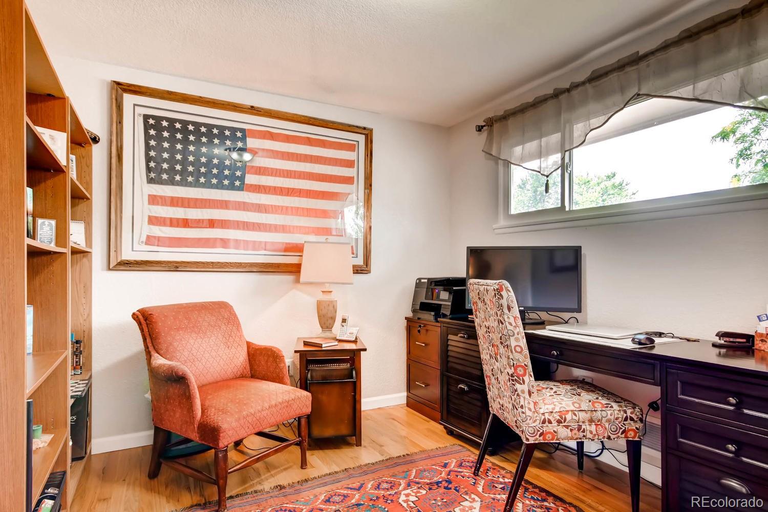 3660 Hoyt Court Wheat Ridge, CO 80033 - Photo 16 of 28 a workspace with furniture and a window