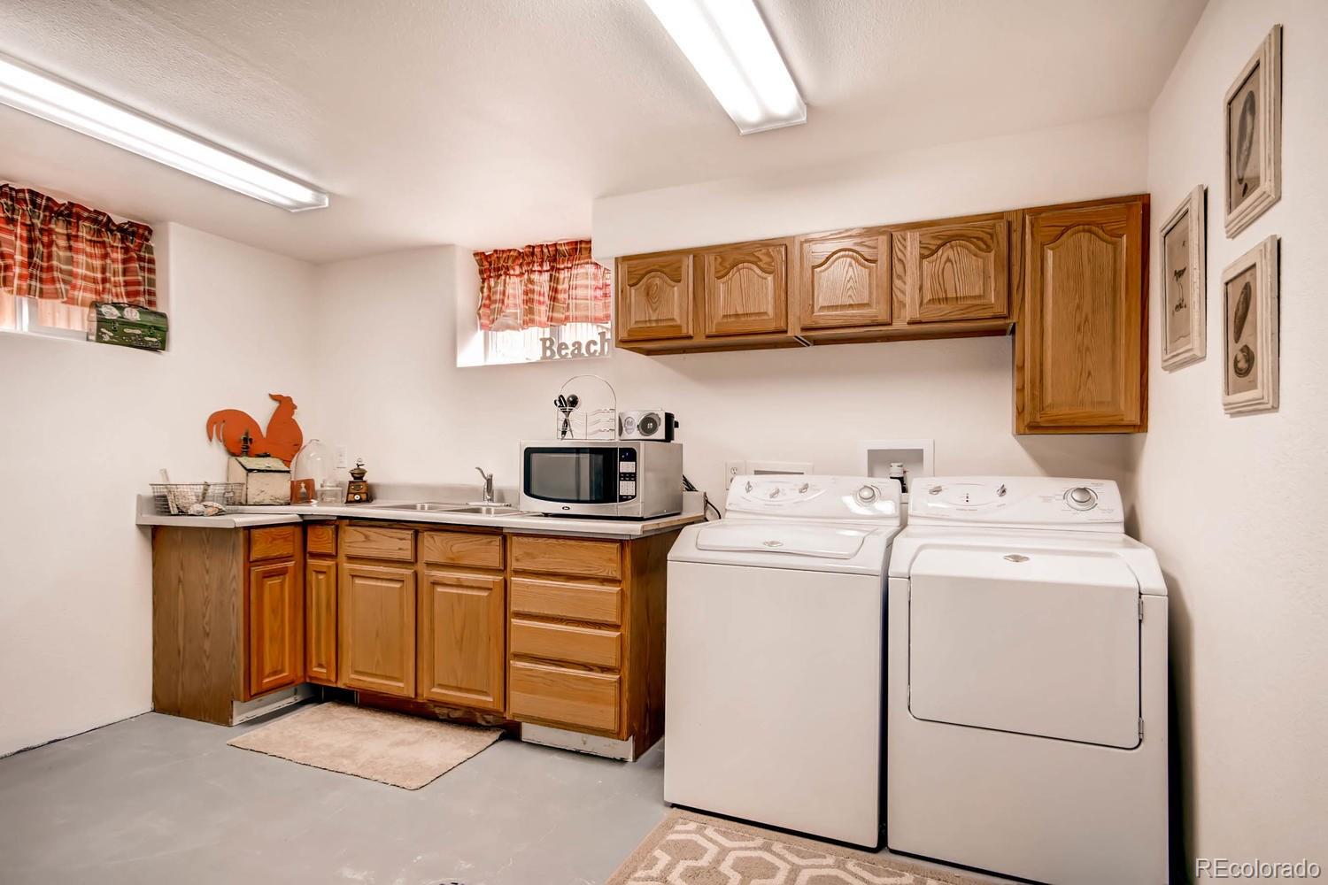 3660 Hoyt Court Wheat Ridge, CO 80033 - Photo 22 of 28 a view of kitchen and sink