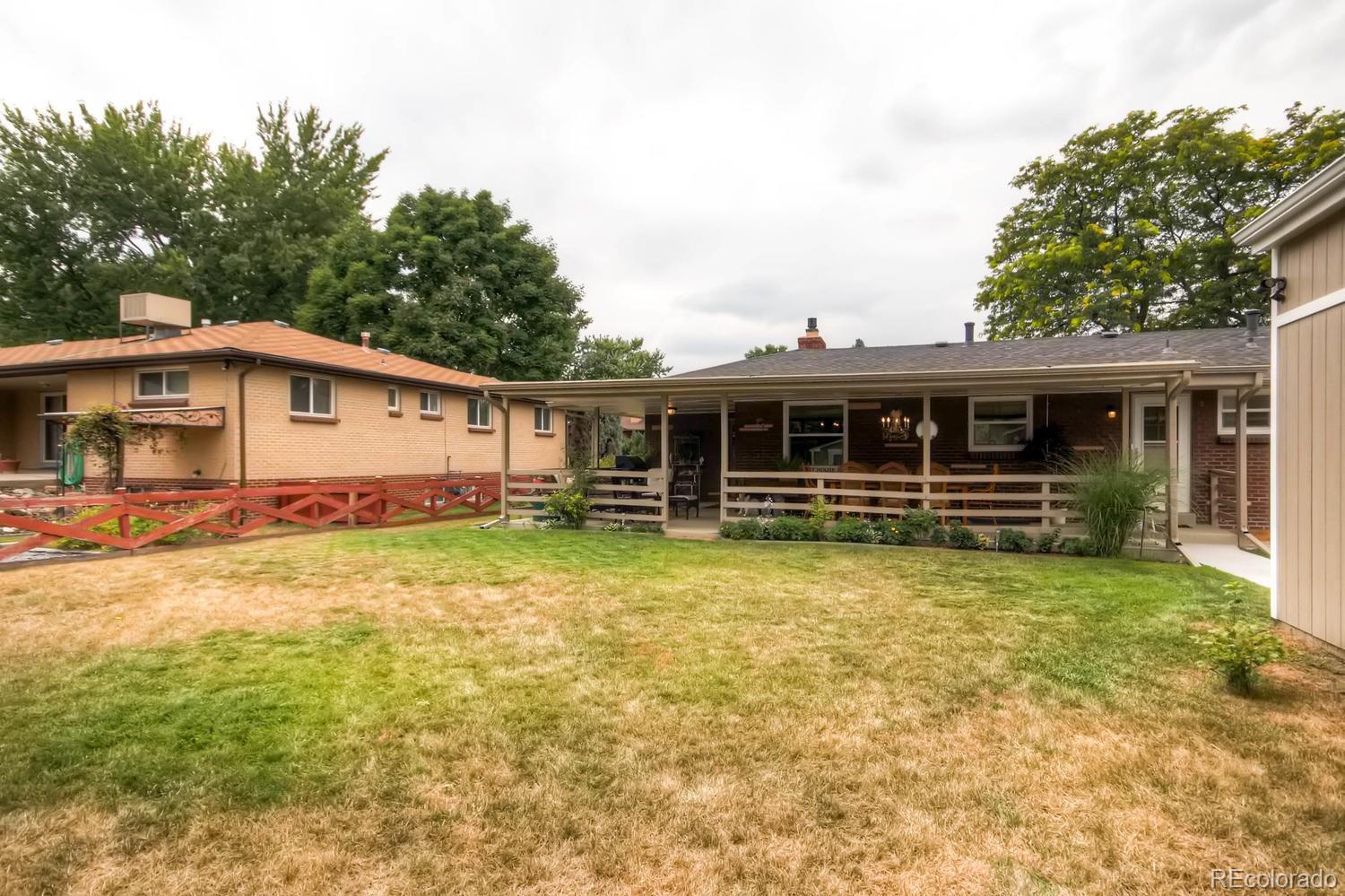 3660 Hoyt Court Wheat Ridge, CO 80033 - Photo 27 of 28 a view of a house with a backyard