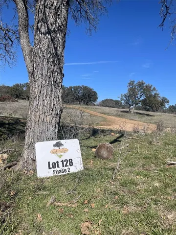 a sign board with an ocean view