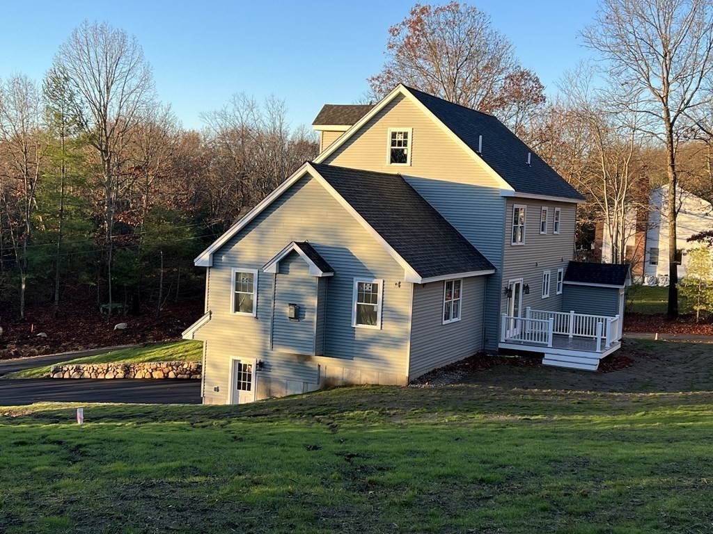 178 Andover Road Billerica, MA 01821 - Photo 3 of 39 a front view of house with yard and trees