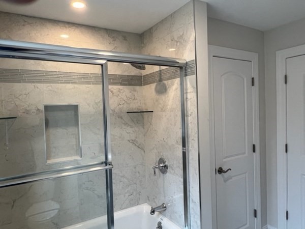 178 Andover Road Billerica, MA 01821 - Photo 32 of 39 a bathroom with a glass shower door