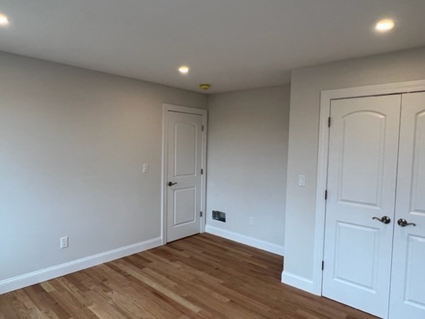 178 Andover Road Billerica, MA 01821 - Photo 35 of 39 a view of an empty room with wooden floor