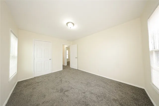 a kitchen with a stove and a microwave
