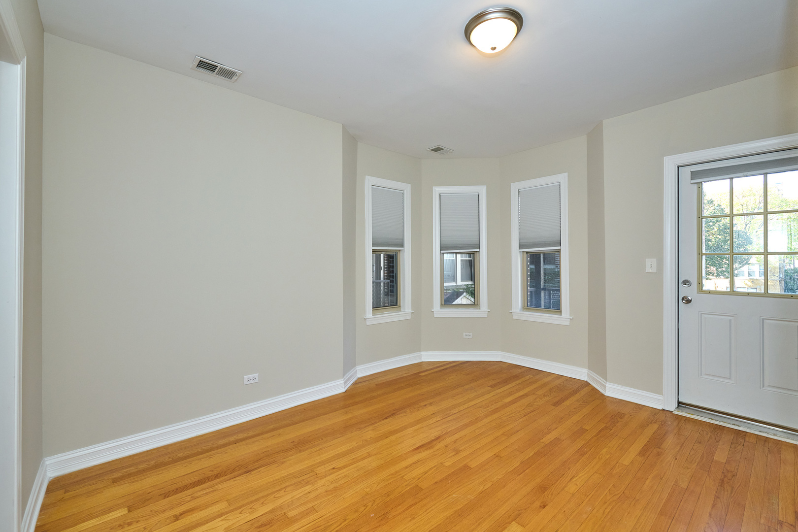 5715 North Kimball Avenue, Unit 1N Chicago, IL 60659 - Photo 16 of 36 a view of empty room with window