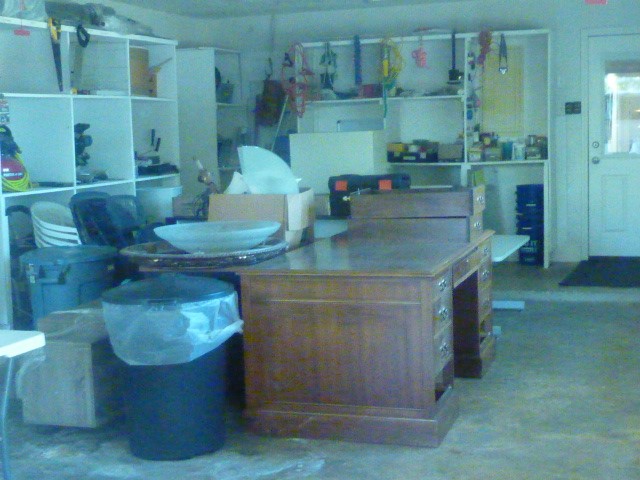 3978 Highway 59 Cleveland, TX 77328 - Photo 8 of 20 a kitchen with a sink and a mirror