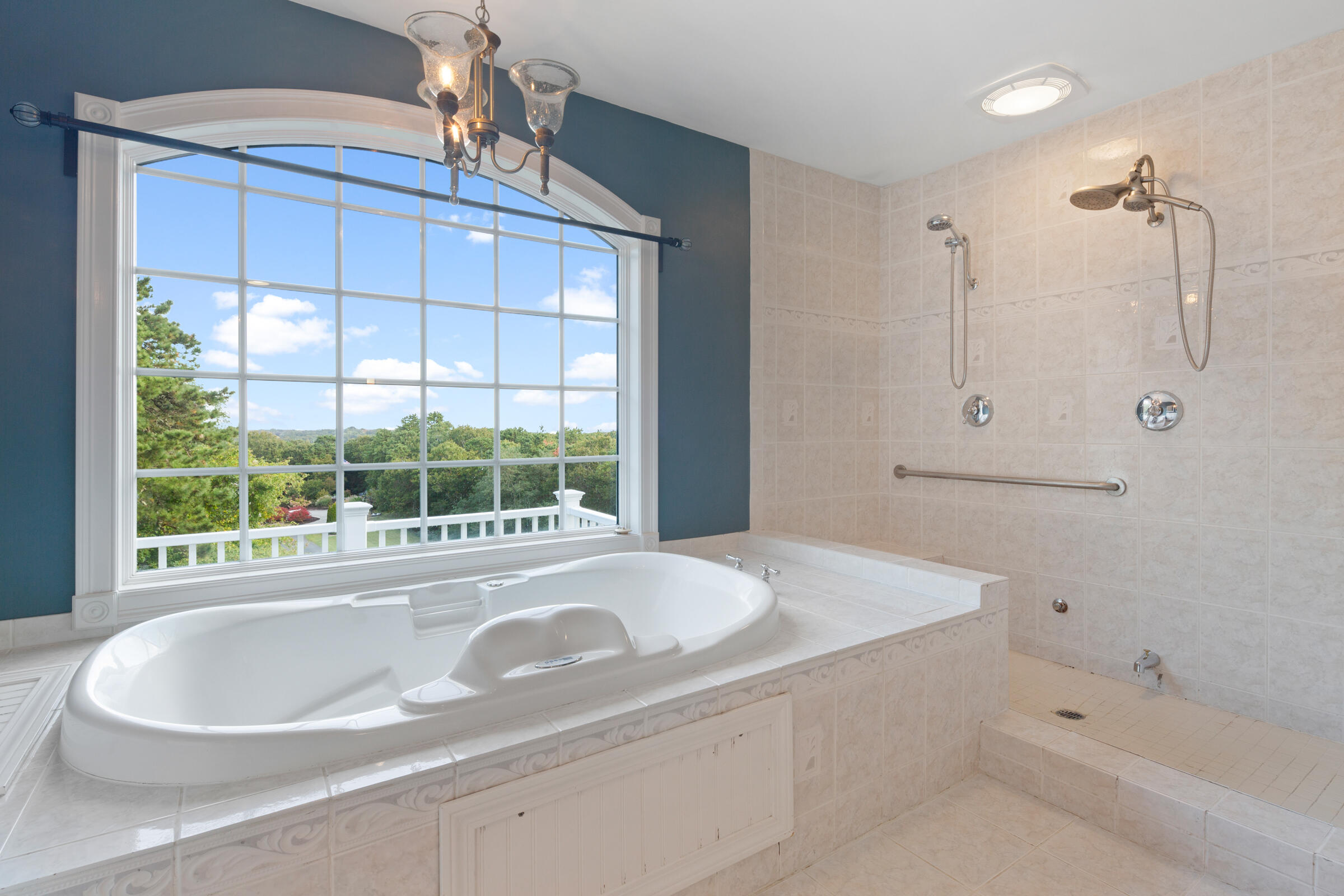 8 Desmond Road Sagamore, MA 02561 - Photo 36 of 71 a bathroom with a bathtub and next to a window