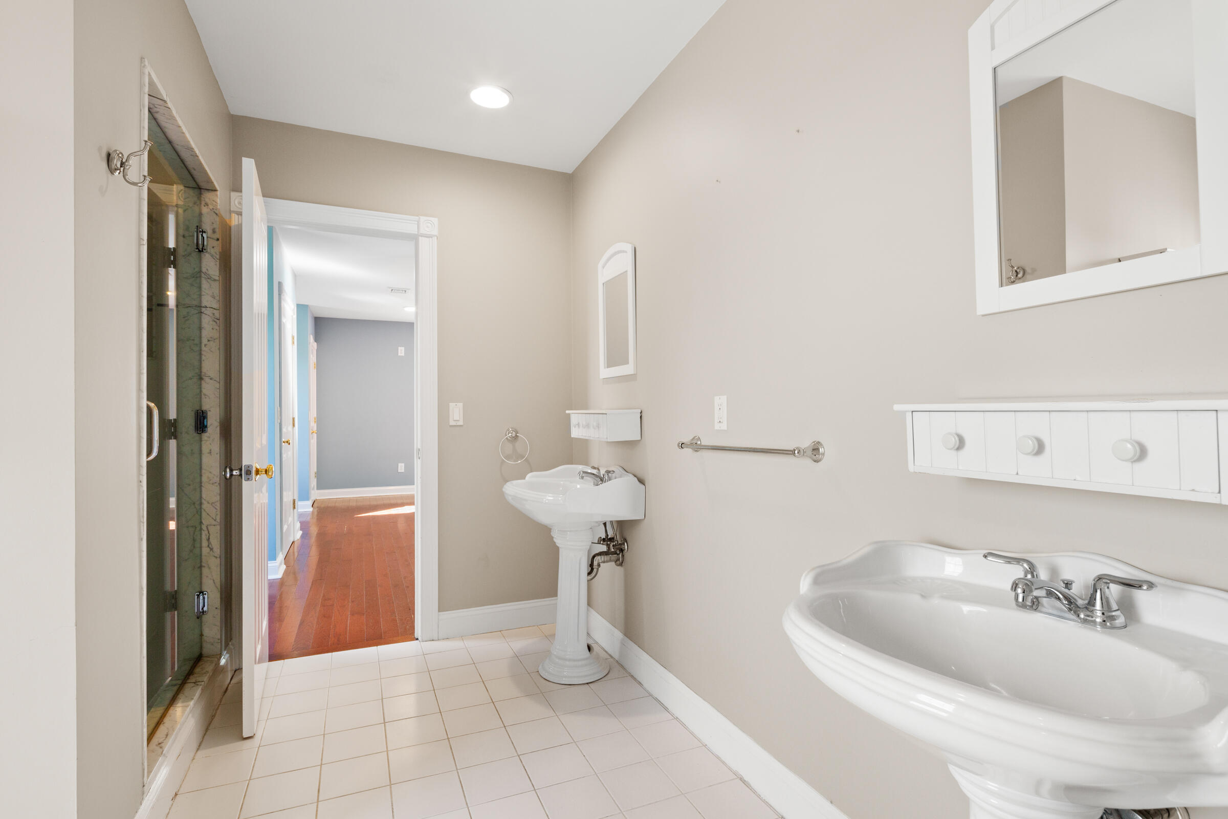 8 Desmond Road Sagamore, MA 02561 - Photo 43 of 71 a bathroom with a sink a toilet and mirror