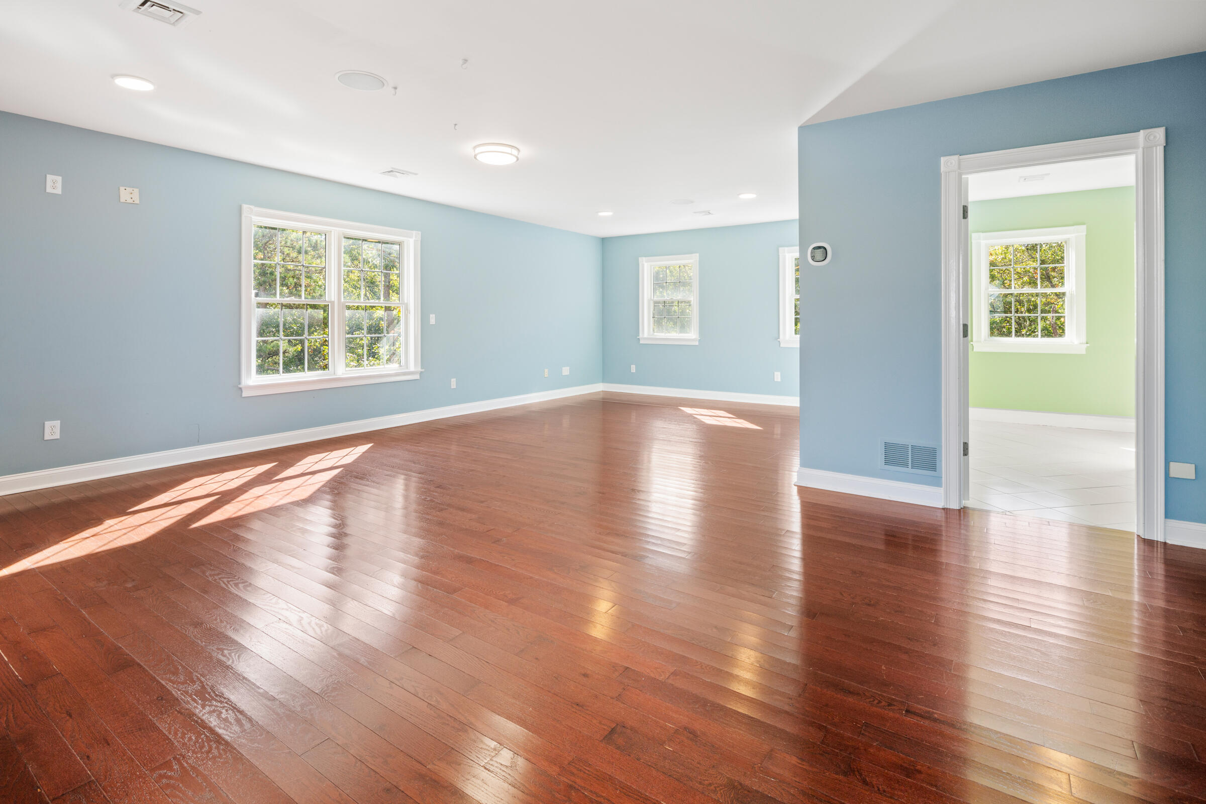 8 Desmond Road Sagamore, MA 02561 - Photo 46 of 71 a view of an empty room with wooden floor and a window