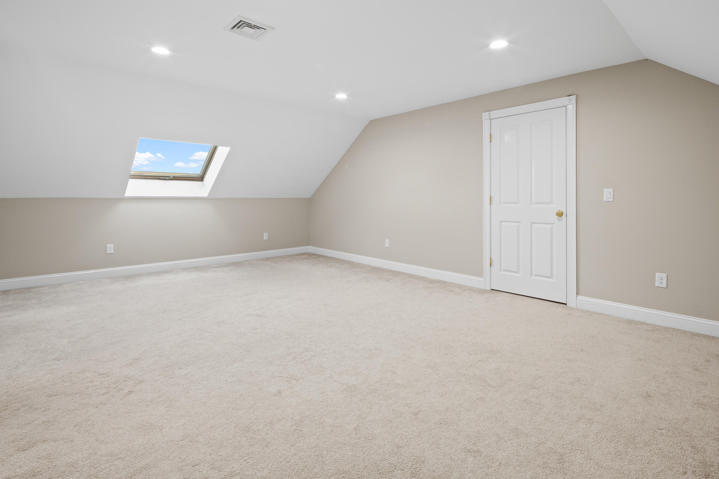 8 Desmond Road Sagamore, MA 02561 - Photo 51 of 71 an empty room with windows and entrance to other room