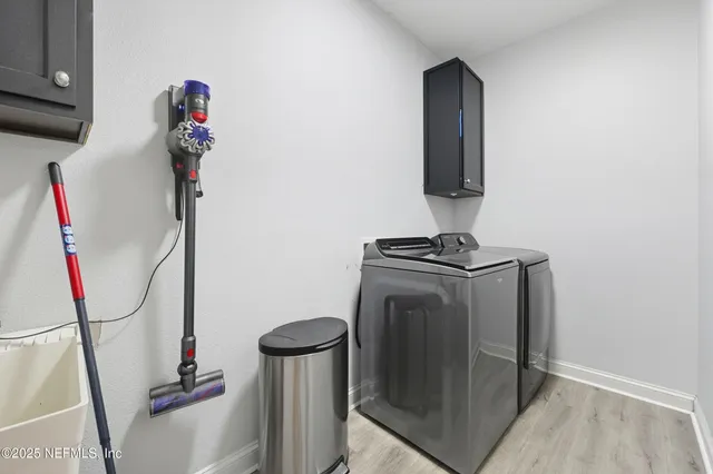 a view of entryway with kitchen