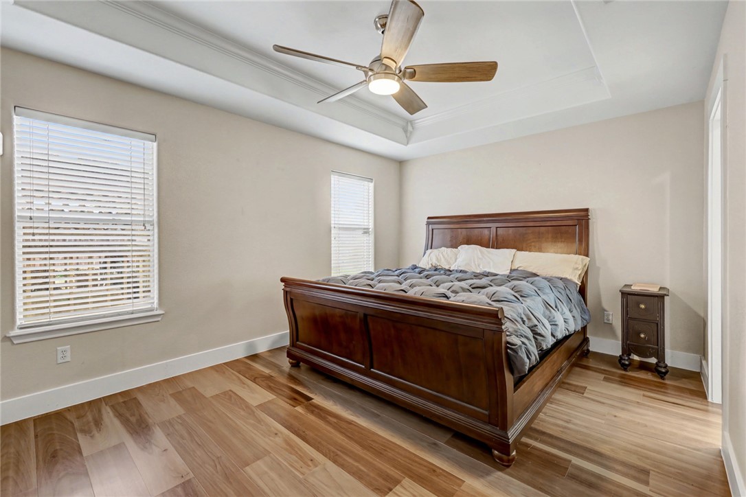 7541 Yorkshire Drive Corpus Christi, TX 78413 - Photo 18 of 32 a bedroom with a bed and window