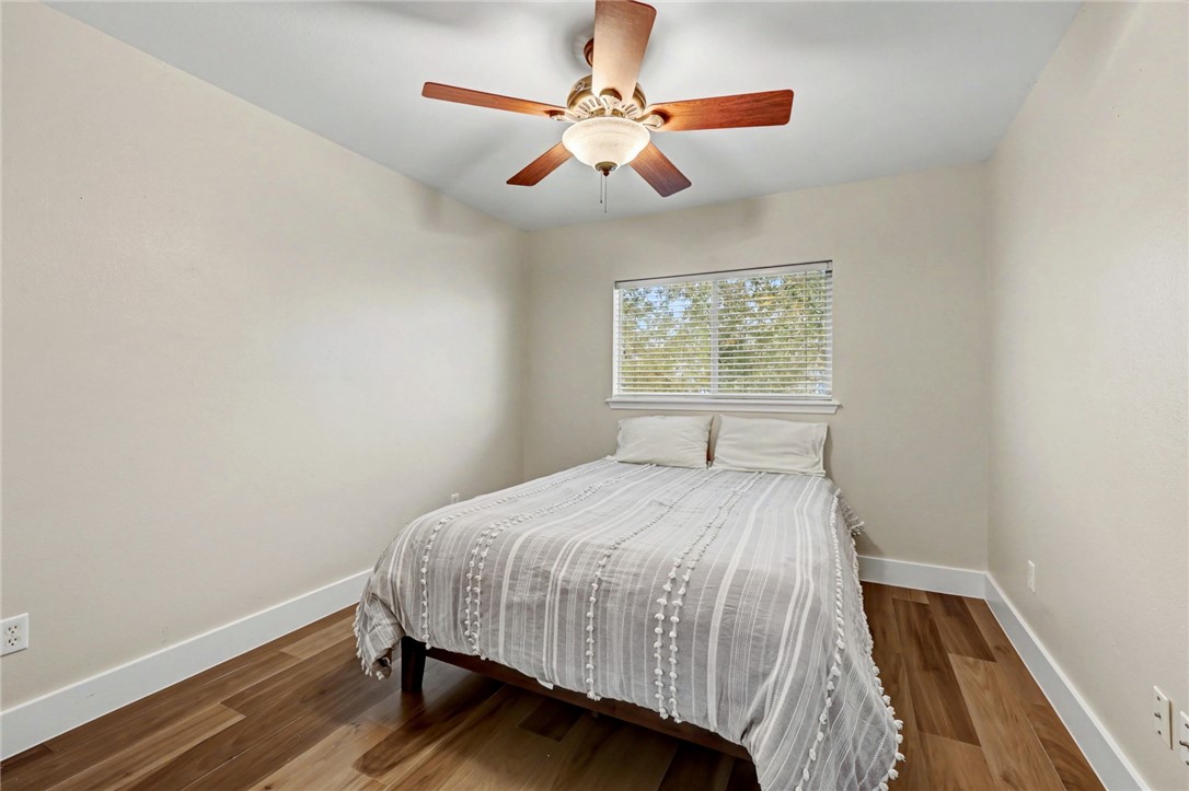 7541 Yorkshire Drive Corpus Christi, TX 78413 - Photo 23 of 32 a bedroom with a bed and a window