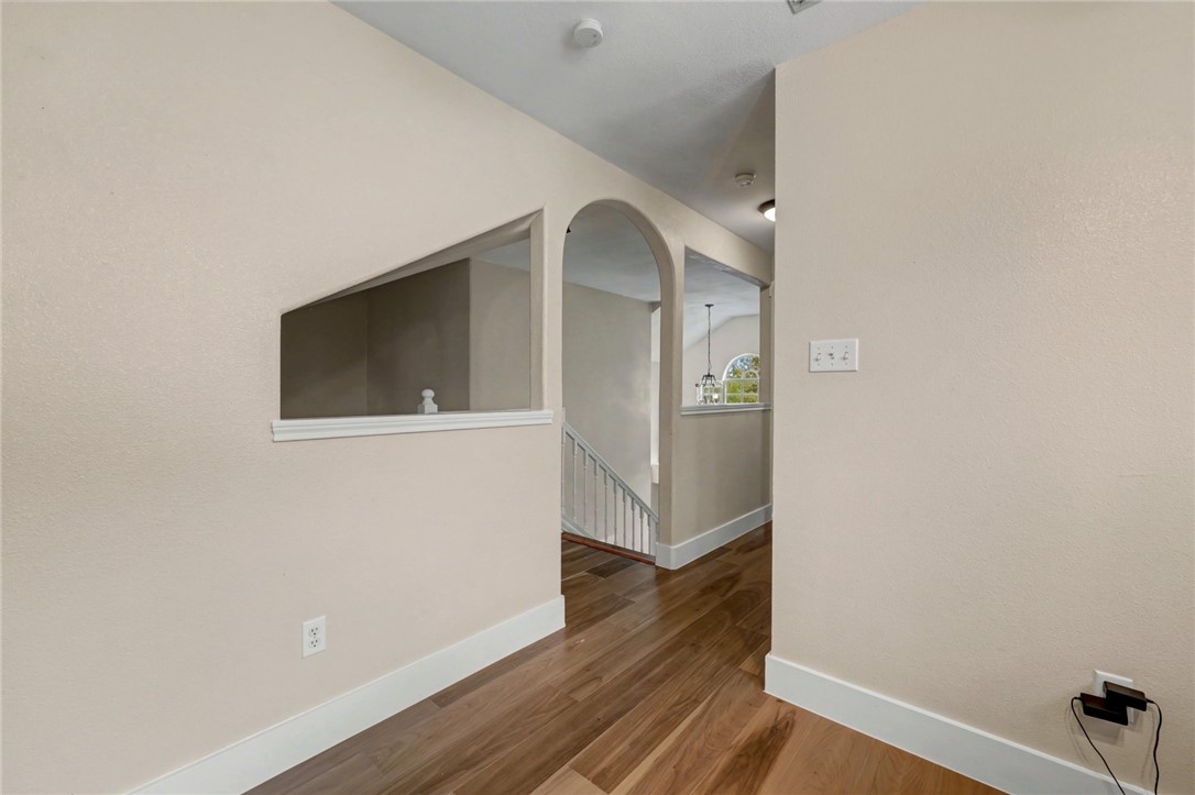 7541 Yorkshire Drive Corpus Christi, TX 78413 - Photo 26 of 32 a view of a hallway with wooden floor and closet