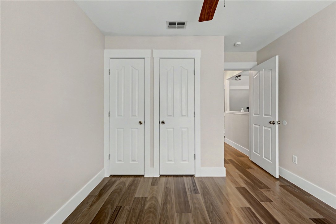 7541 Yorkshire Drive Corpus Christi, TX 78413 - Photo 27 of 32 a view of a hallway with wooden floor
