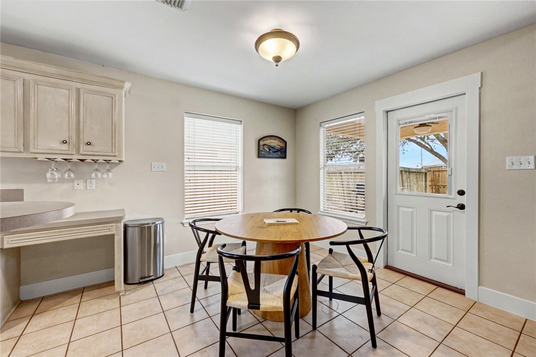 7541 Yorkshire Drive Corpus Christi, TX 78413 - Photo 10 of 32 a dining room with furniture and window