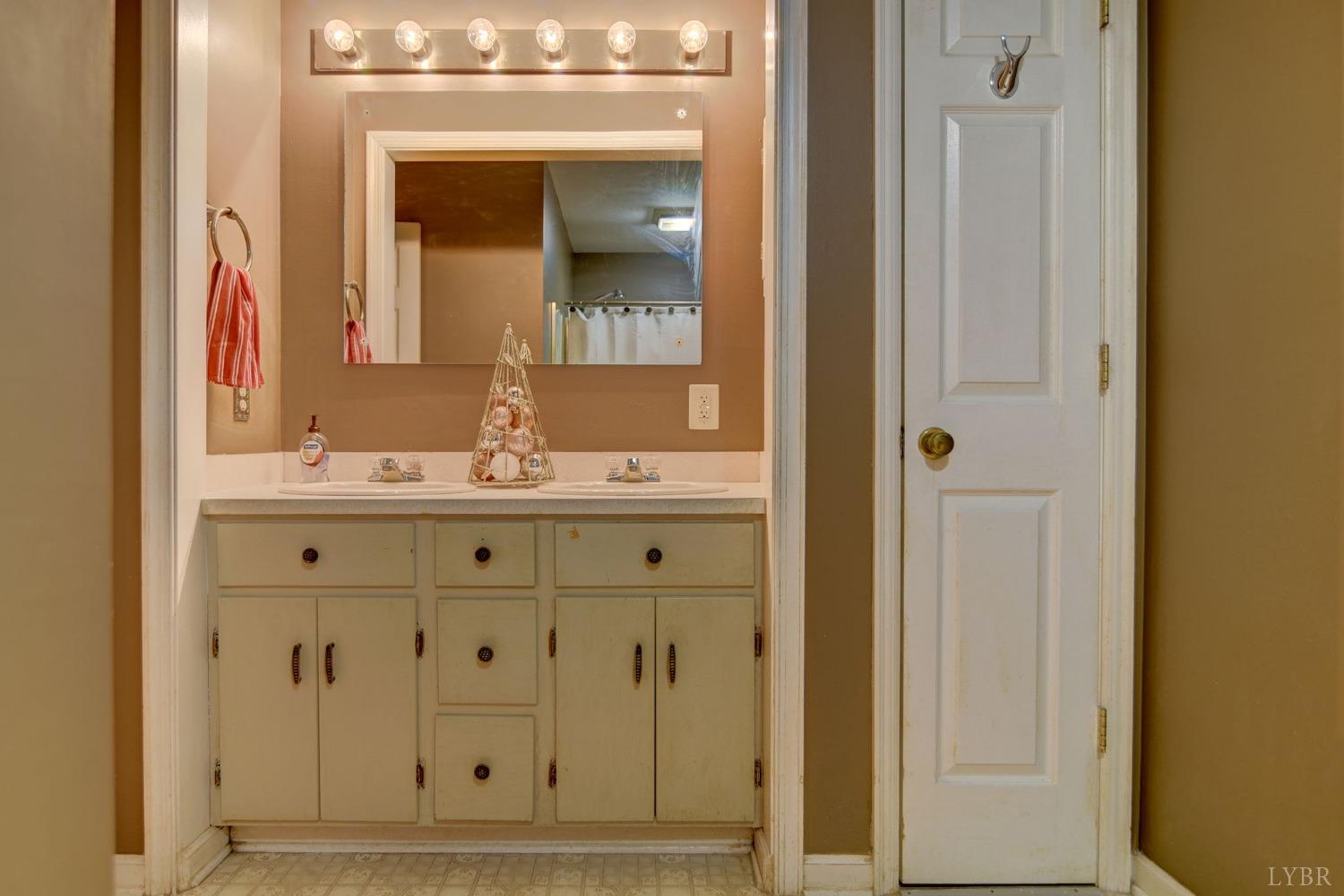 161 River Ridge Road Madison Heights, VA 24572 - Photo 13 of 36 a bathroom with a granite countertop sink vanity and mirror