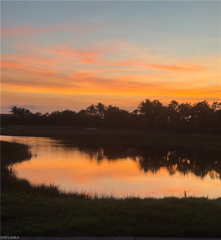 10231 Glastonbury Circle, Unit 101 Fort Myers, FL 33913 - Photo 21 of 35 a view of lake
