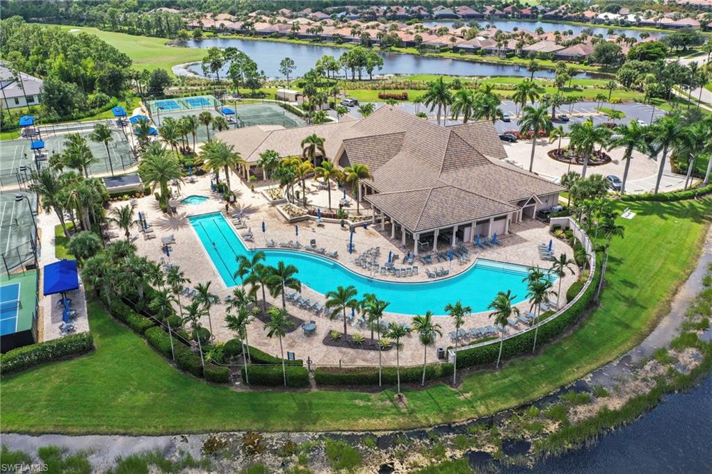10231 Glastonbury Circle, Unit 101 Fort Myers, FL 33913 - Photo 29 of 35 an aerial view of a house with a garden