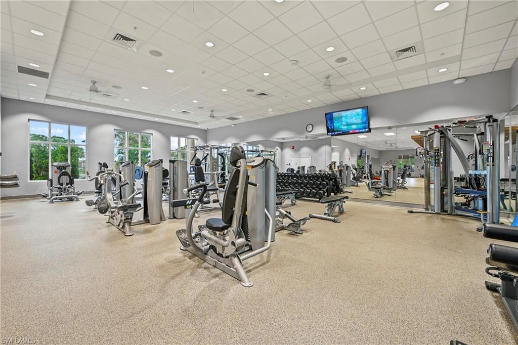 10231 Glastonbury Circle, Unit 101 Fort Myers, FL 33913 - Photo 31 of 35 a view of a room with gym equipment