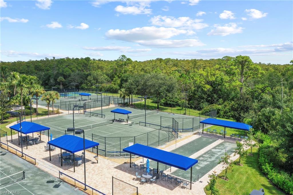 10231 Glastonbury Circle, Unit 101 Fort Myers, FL 33913 - Photo 34 of 35 a view of a terrace with furniture and stove