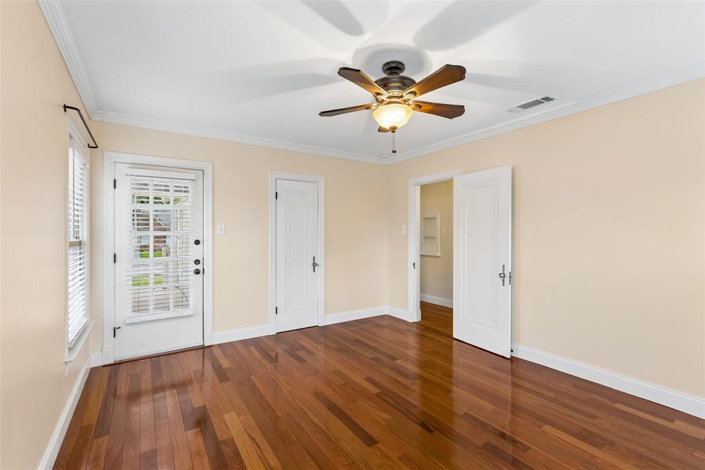 2427 Alco Avenue Dallas, TX 75211 - Photo 15 of 26 a view of an empty room with wooden floor