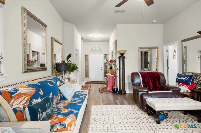 a living room filled with furniture and a couch