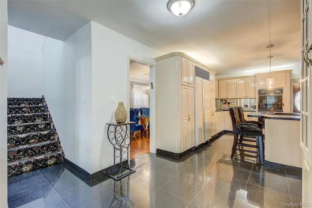 a view of dining room with furniture and wooden floor