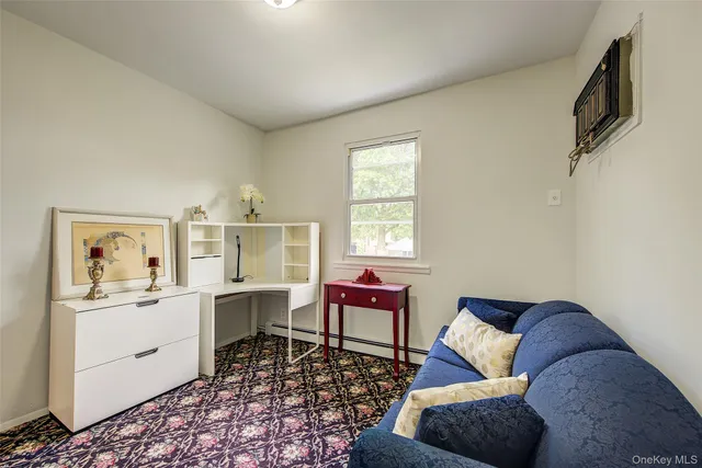 a living room with furniture and a table