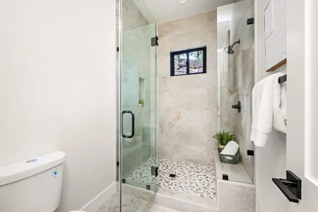 a bathroom with a shower curtain