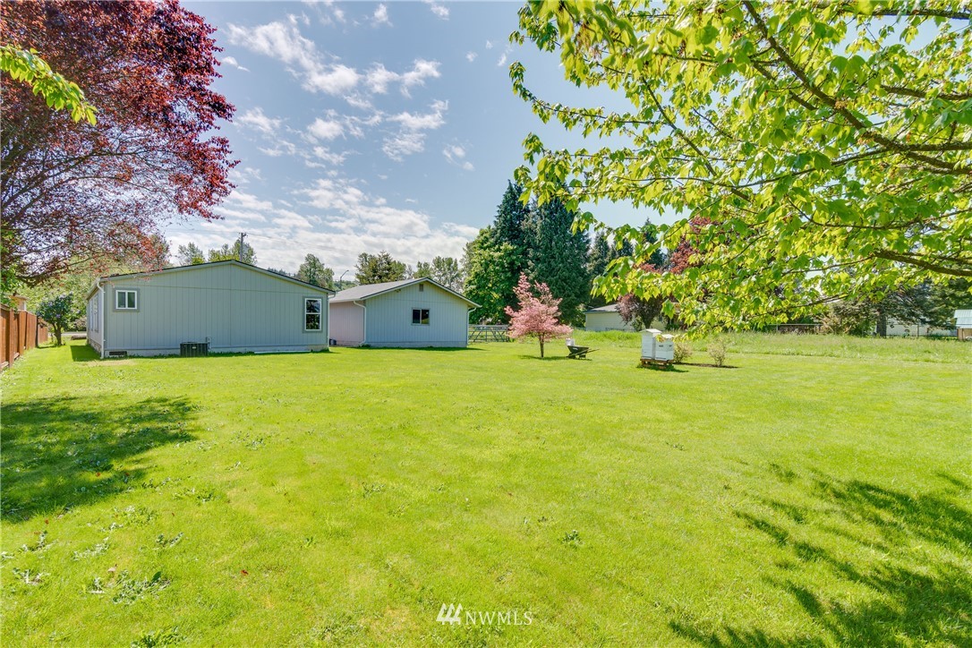 5509 Mt Solo Road Longview, WA 98632 - Photo 19 of 22 a view of a house with a yard