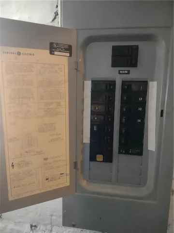 a bathroom with a glass shower door and a sink