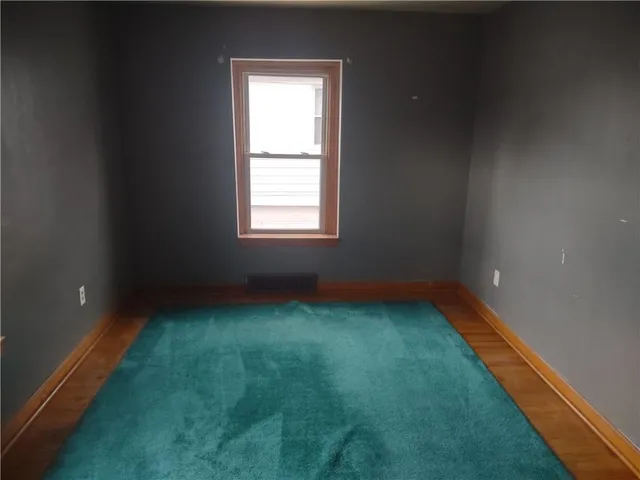 a view of an empty room with window