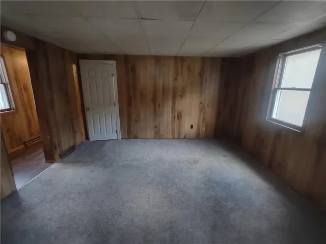 a view of empty room with windows