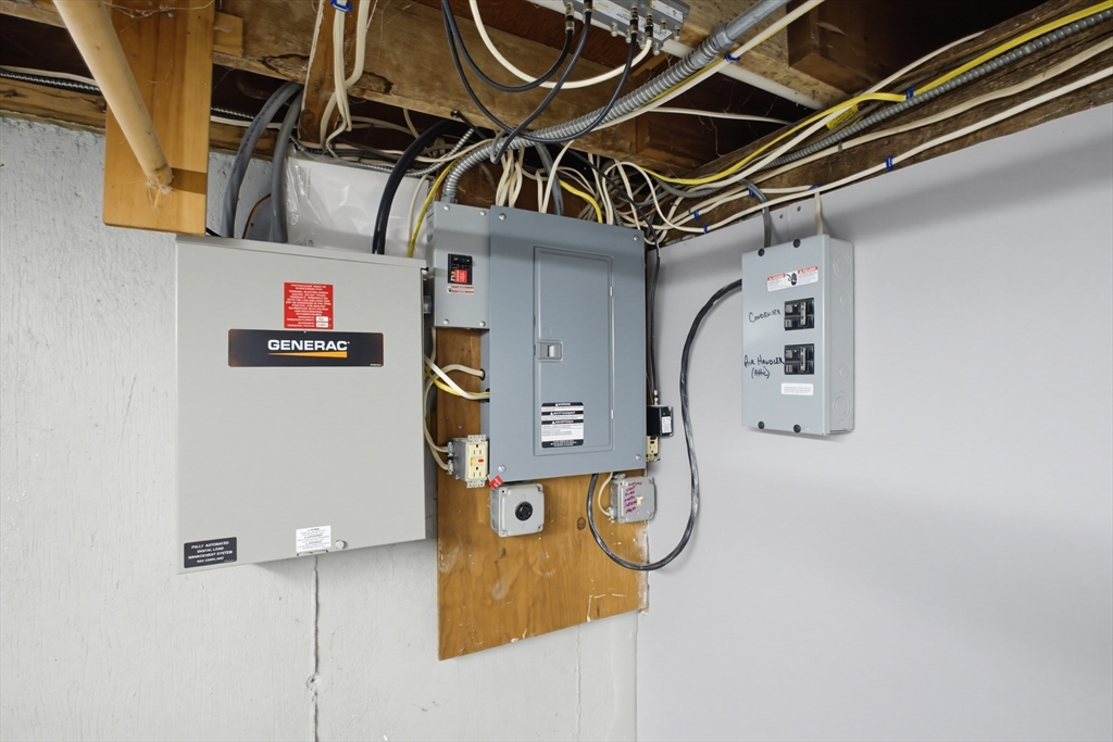433 Pearse Road Swansea, MA 02777 - Photo 34 of 40 a water heater on the wall
