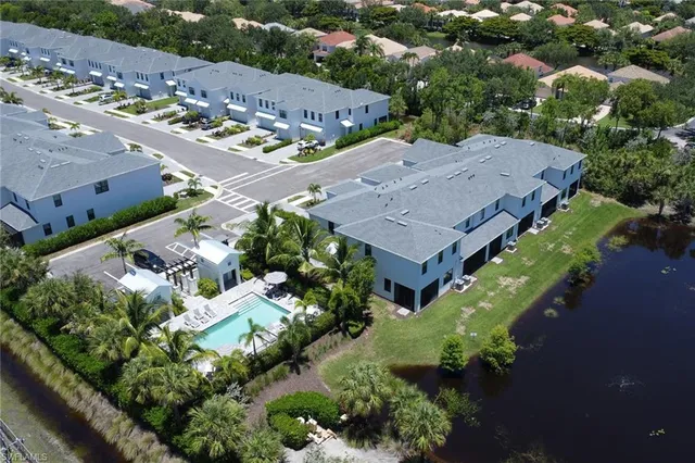 an aerial view of a house with a garden