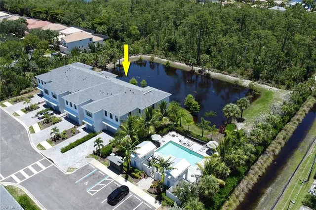 an aerial view of a house with a garden