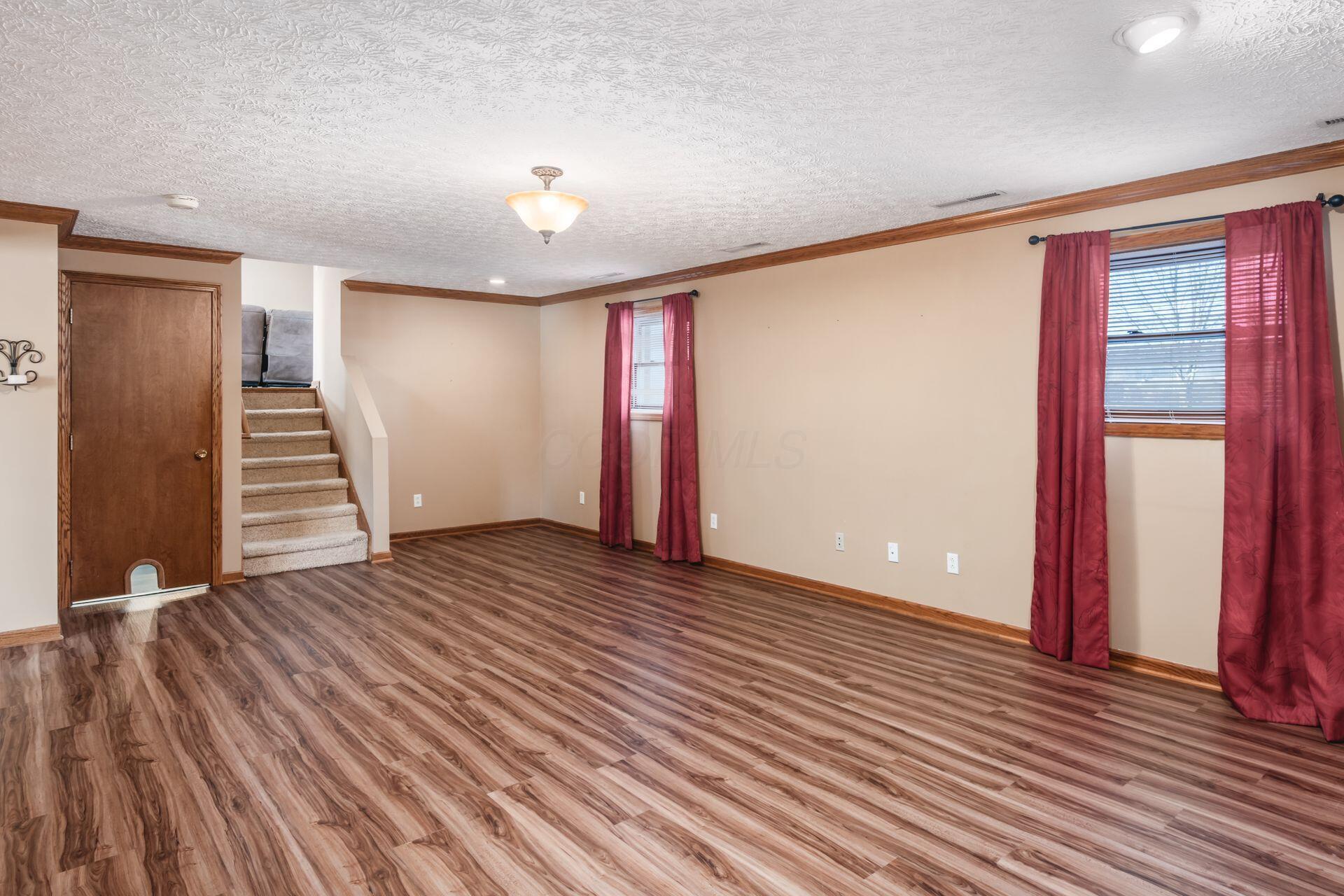 10862 Center Village Road Galena, OH 43021 - Photo 25 of 40 Ceiling lighting and double windows