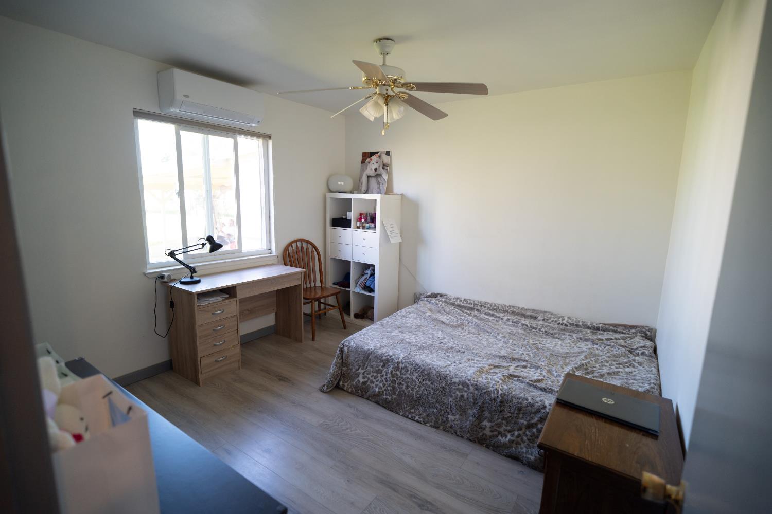 4551 Wheatland Road Wheatland, CA 95692 - Photo 16 of 50 a bed room with a bed and a window