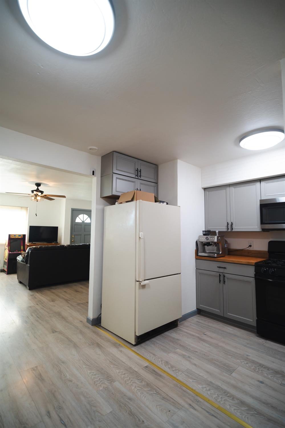 4551 Wheatland Road Wheatland, CA 95692 - Photo 33 of 50 a kitchen with stainless steel appliances a refrigerator and a stove top oven