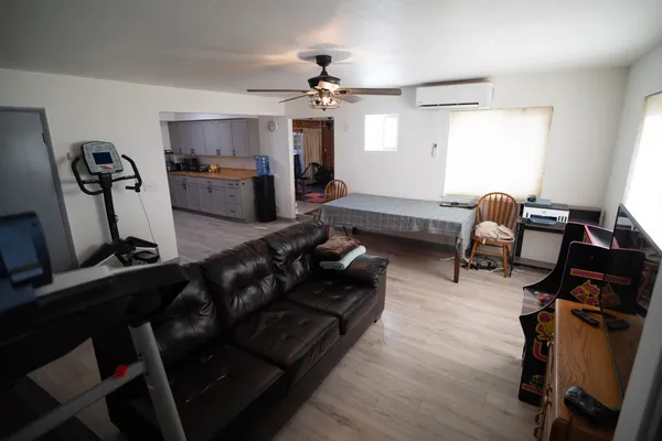 a view of a hallway view with wooden floor